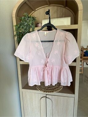 Light Pink Tie-Front Peplum Blouse with Embroidered Detail